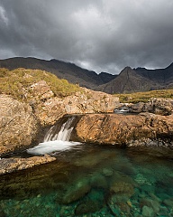 the turquise colour of one of the Fairy Pools on the Isle of Skye