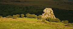 Stong sunlight hits Vixen Tor on Dartmoor
