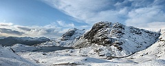 stickle tarn in the lake district beneath the langdale pikes
