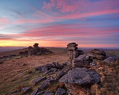 a vivid pink sunset over staple tor