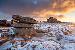 Fur Tor on Dartmoor with the sky lit up by the rising sun