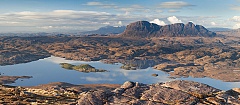 sunshine over assynt from Stac pollaidh on a clear day
