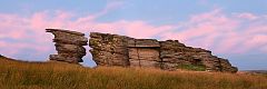 pink clouds behind Watern Tor at sunrise